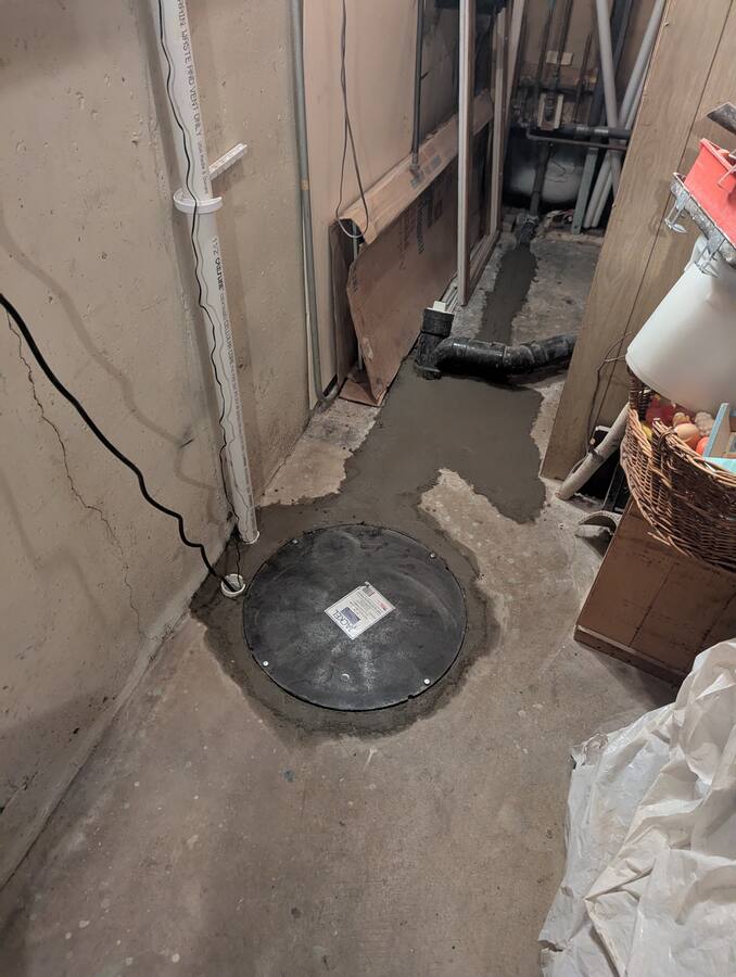 Finished Jackel sump lid sealed in the basement floor