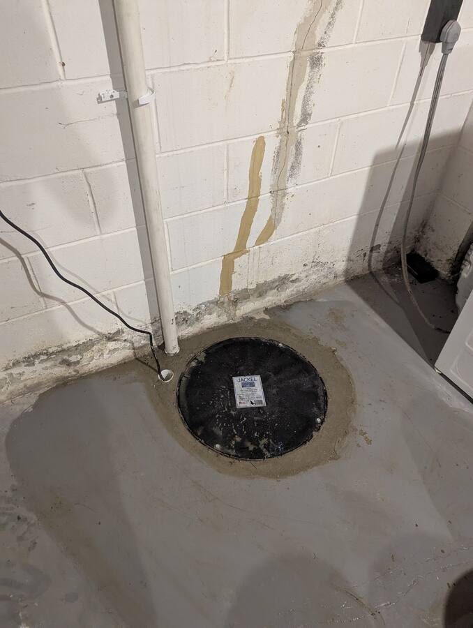 Completed sump pit with sealed lid and dedicated power
